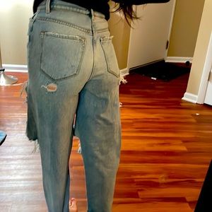 High waisted light wash jeans that we ripped/designed by me after purchase